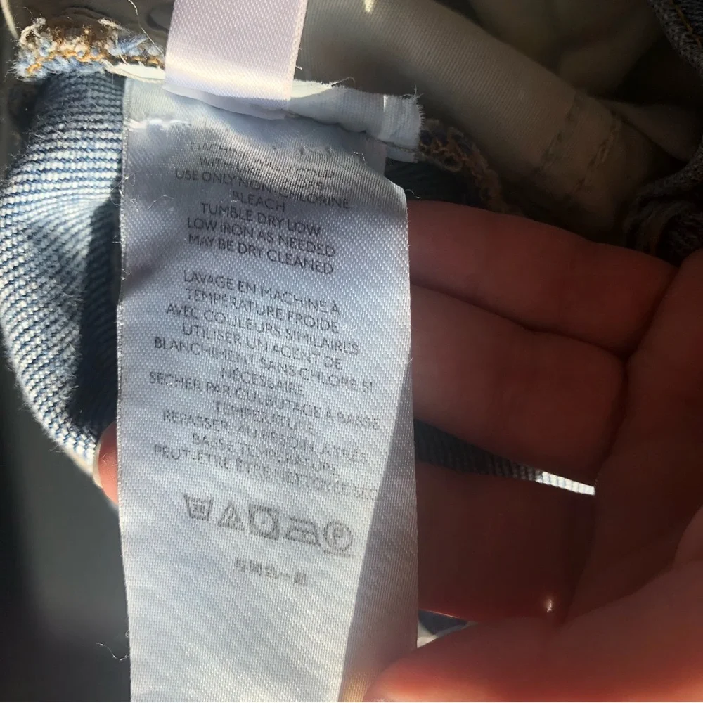 Free people we the free phoenix distressed blown out knees high rise jeans